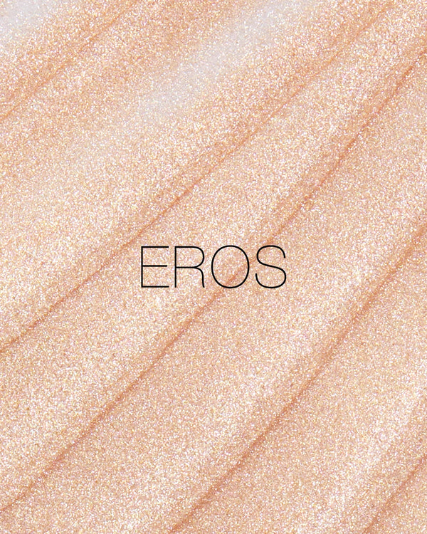 מריחה של סטיק ההארה Light Reflecting Luminizing Stick של NARS בגוון Eros, על רקע בהיר. התמונה מדגישה את הגוון הפנינתי, הברק העדין והגימור הזוהר והקורן של הפורמולה.